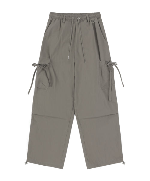 [𝐅𝐚𝐧𝐜𝐲 𝐜𝐥𝐮𝐛©] RIBBON CARGO PARACHUTE PANTS (2 color)